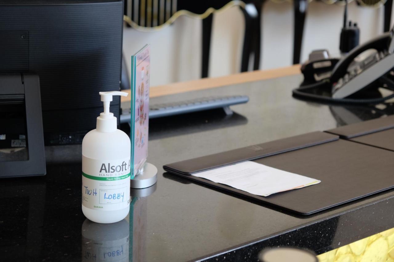 The Waterfront Hotel Kuching Ngoại thất bức ảnh A bottle of hand sanitizer